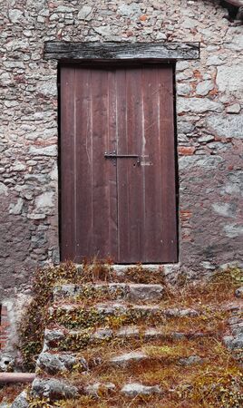 Mountain old barn with staircase in summer timeの写真素材
