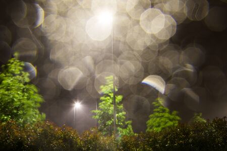 raindrops on the camera lens, rainy eveningの写真素材