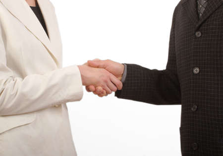 White man and woman - business handshake - fragile ; close upの写真素材