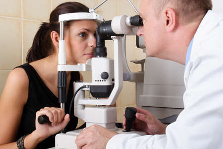 Eye doctor performing an eye examination