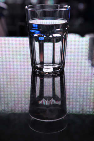 tall glass of water on the counterの写真素材