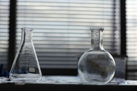 Closeup of glass  test tubes in dark laboratory