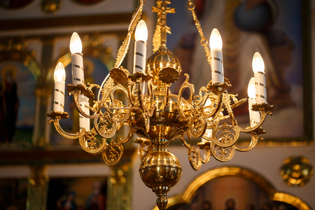 luxurious interior of the temple with a large chandelierの写真素材