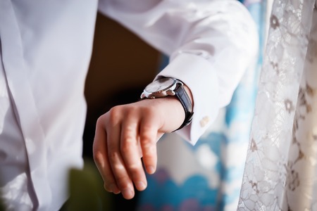 a man wearing a white shirt elegant for wedding