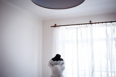 elegant wedding dress standing in a luxurious room Brideの写真素材