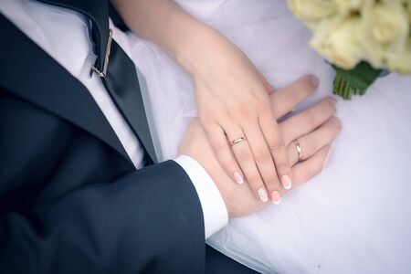 hands of a young couple in loveの写真素材