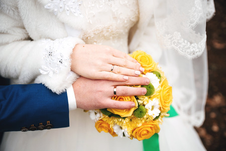 hands of a young couple in loveの写真素材