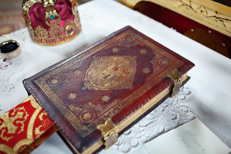 large beautifully decorated books of the Bible on the tableの写真素材