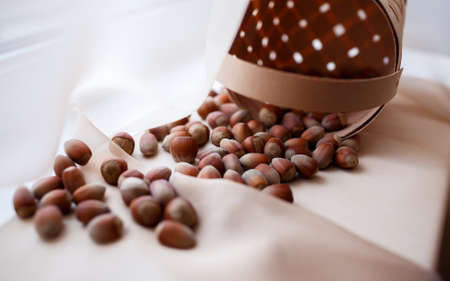many nuts fell out of the basketの写真素材