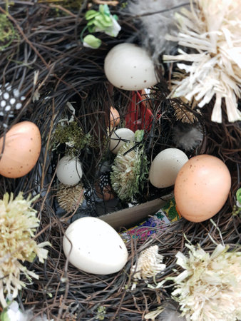 On the eve of Easter, festive decorations in the form of colorful Easter eggs and decorative...