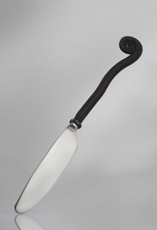 a close up of isolated knife with decorationの写真素材