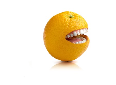 smiling orange over white backgroundの写真素材