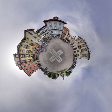 Panorama village square flagging cloudy sky ball hole around. Shoot in Intra Verbana north of Italyの写真素材
