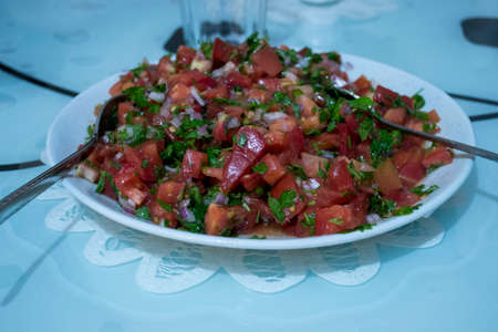 Fish and salad will complement each other.の写真素材