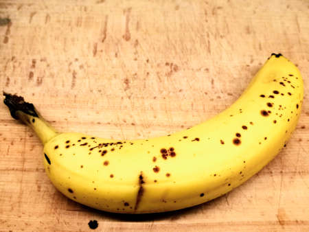 banana fruit on wooden tableの写真素材