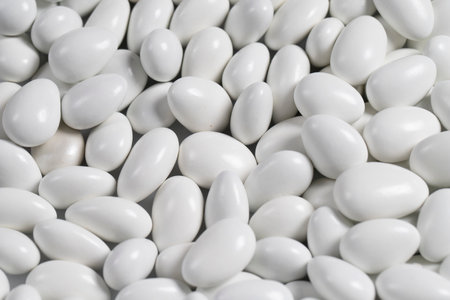 Almond candy in the form of a heap. Sugar coated on the outside, almond on the inside. close upの写真素材