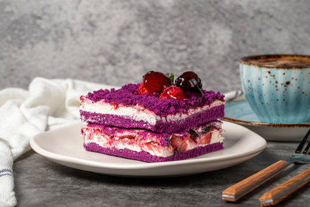 Forest fruit cake slice on dark background. Strawberry, blackberry and raspberry, black mulberry...