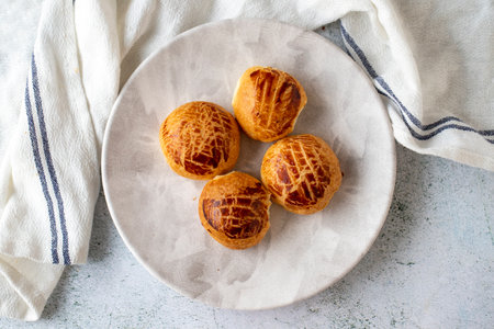 Turkish little pogaca. traditional flavors. Pogaca on gray background. Top viewの写真素材