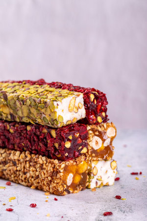 Assortment of Turkish delight with pistachio on a gray background. Mixed Turkish Delight. close-up. local name suppository Turkish delightの写真素材