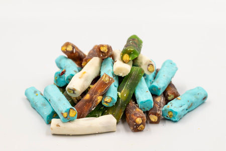 Assortment of Turkish delight with pistachio wick isolated on white background. Traditional Turkish cuisine delicacies. close upの写真素材
