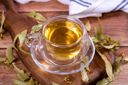 Linden tea. Linden tea on wood floor. Herbal tea concept. healthy drinks. close upの写真素材