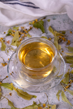 Linden tea. Linden tea on stone background. Herbal tea concept. healthy drinks. close upの写真素材