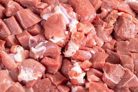 Lamb cubed meat. Close-up of chopped red meat. Butcher productsの写真素材