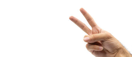 Adult hand making peace sign isolated on white background. Making two signs by hand. Space for text