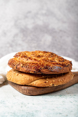 Poppy bread. Bread prepared with poppy on stone background. close up