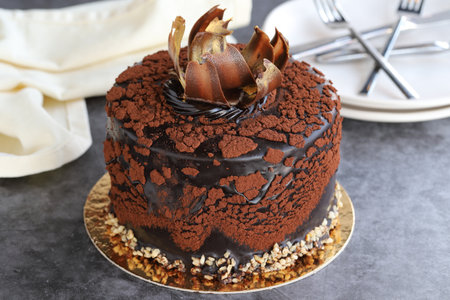 Chocolate cake. Celebratory cake on a dark background. close up