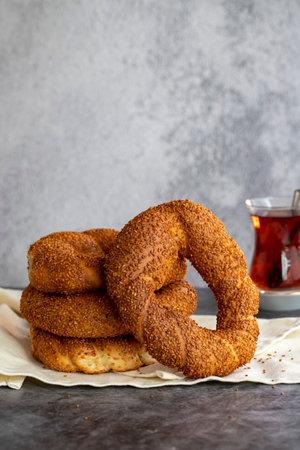 sesame bagel. Turkish pastry product. Sesame bagel on a dark background. close-up. local name sesame...