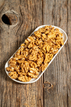 Walnut on wooden background. close-up walnut kernel