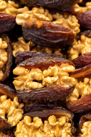 Walnut date fruit. Walnut filled dates healthy food. close-up. local name dates with walnutsの写真素材