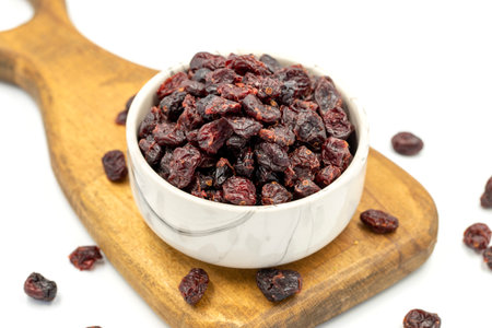 Dried blueberry on a white background. Healthy and fresh nuts. close-up.の写真素材