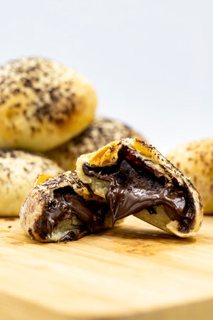 Chocolate filled cookies ( Ä°zmir bomb cookie ). Cookies with liquid chocolate filling on a white background. local name izmir bomba. close upの写真素材