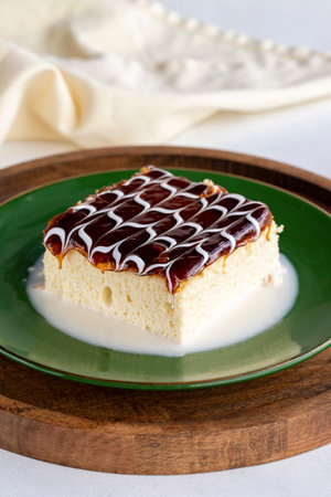 Caramel trilece cake. Trilece cake on a white background. . Bakery products. close-up. local name...