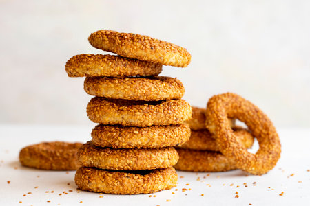 Turkish Bagel Kandil simit (stack of pastry). sesame bagel on a white background. local name lamp ringの写真素材