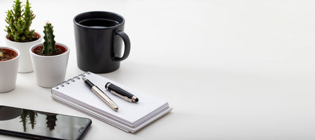 work desk. With smartphone, Coffee, tiny cactus and notepad