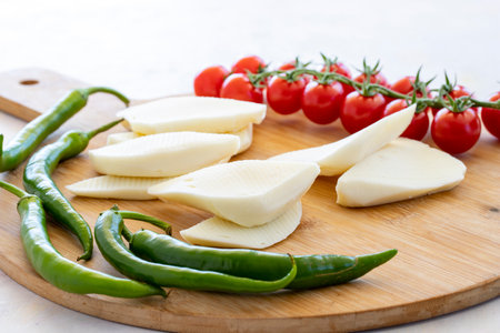 Close-up cheese on wooden background. Local name lavash cheese