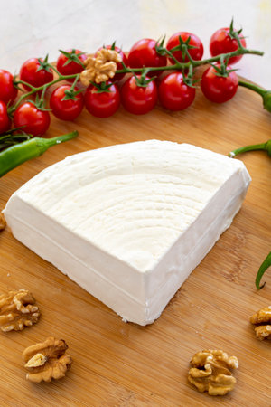 Close-up cow cheese on wooden background. local name cartの写真素材