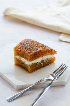 Creamy bread dessert on a white background. Local name bread kadayif with creamの写真素材