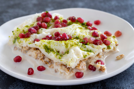 Gullac dessert on dark background. The traditional Ramadan dessert gullac. Milk dessert.の写真素材