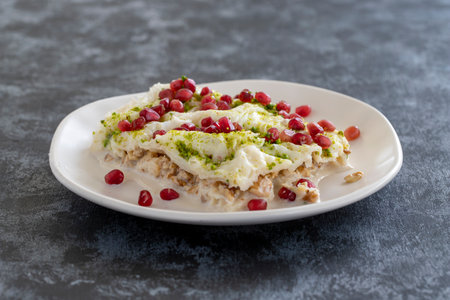 Gullac dessert on dark background. The traditional Ramadan dessert gullac. Milk dessert.の写真素材