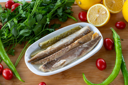 Fillet mackerel on wooden background. Seafood dishes. local name sooty mackerel