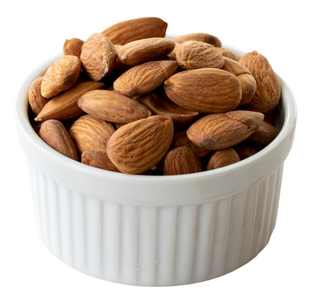 Almond isolated on white background. Almonds in a plateの写真素材