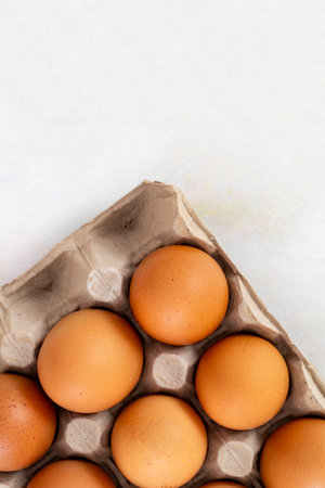 Chicken Egg on a white wooden background. organic eggs. Top view. Egg boxes Copy space