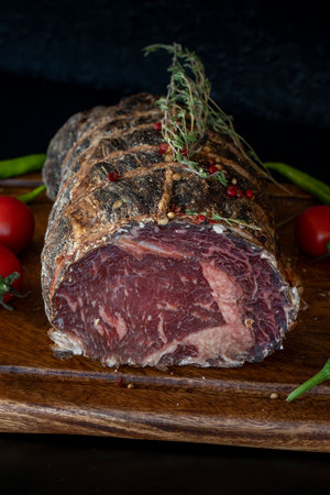 Veal in sauce, carefully dried on a dark backgroundの写真素材