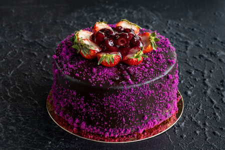 Celebratory cake with blueberries and strawberries on a dark background. candleless birthday cakeの写真素材