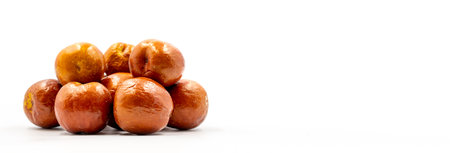 Jujube on a white background. Combined with a ripe jujube shade. Empty space for text. copy space