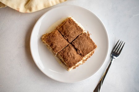Cold baklava on a white background. Turkish sweet dessert concept. plate of sliced forest fruit...